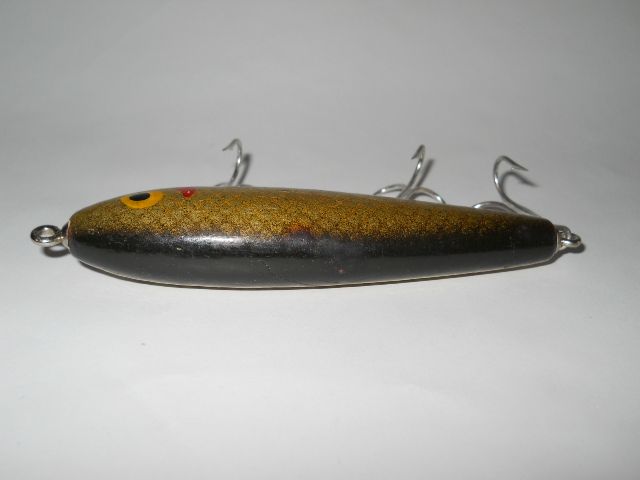 To see photos of Rare and Collectible Antique Fishing Lures and Reels 