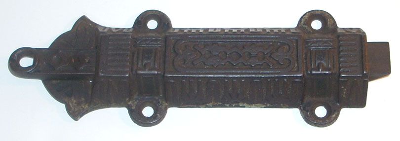 This is an Ornate Antique Cast Iron Dead Bolt / Latch.