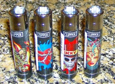 LOT OF 4 CLIPPER TATTOO REFILLABLE LIGHTERS   FULL SET  