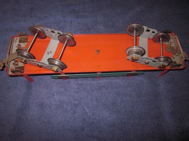 AMERICAN FLYER 4022 WIDE STANDARD GAUGE MACHINERY FLAT CAR WITH STAKES 