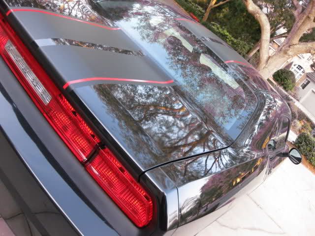   our stripes to his car and sending pics of the finished work