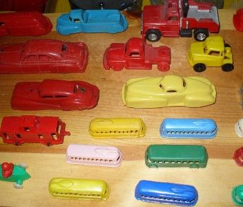   lot of old toy plastic cars and trucks sold as is for parts  