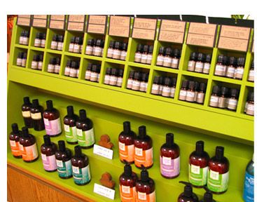 All kinds of essential oils displayed.