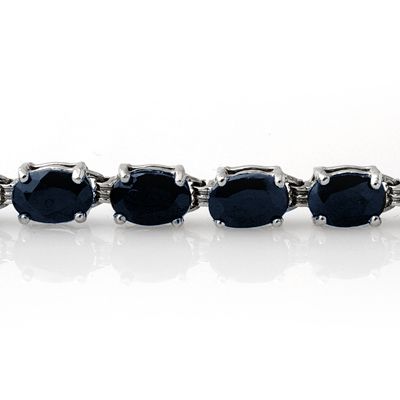 GENUINE 35.00 ctw SAPPHIRE BRACELET ELEGANTLY SET IN SOLID 10KT GOLD.