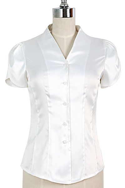   made of polyester it features a rounded high collar and short puff