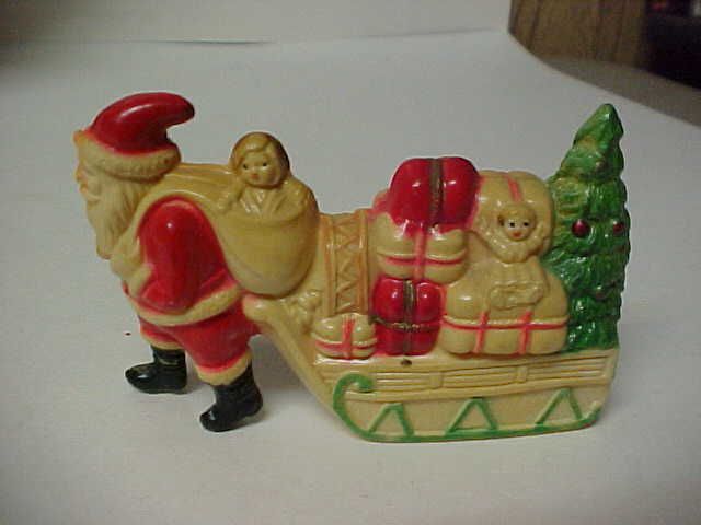 Fantastic Old Christmas Celluloid SANTA PULLING SLED  